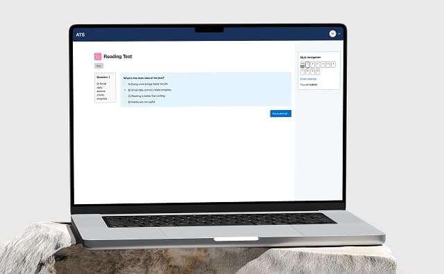 Adaptive Testing System metrics shown inside a laptop mockup