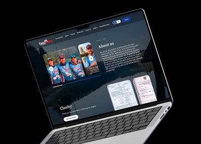 Troutarea about and charity screen shown on a laptop